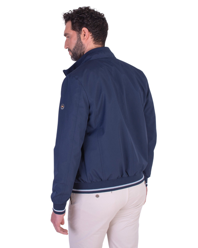 CAZADORA TEJIDO TECNICO ELASTICOS COMBINADOS FORRO REJILLA